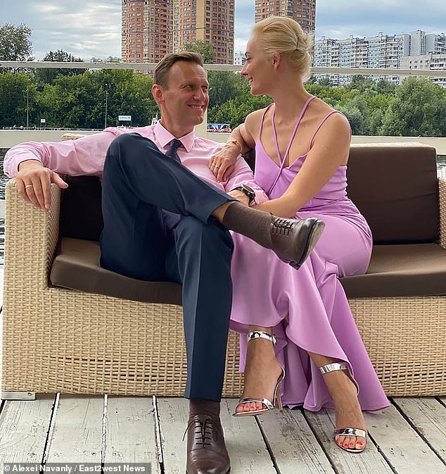 Navalny, pictured with his wife Yulia in happier times, waged a crusade against official corruption and organized mass protests against the Kremlin, angering the Kremlin