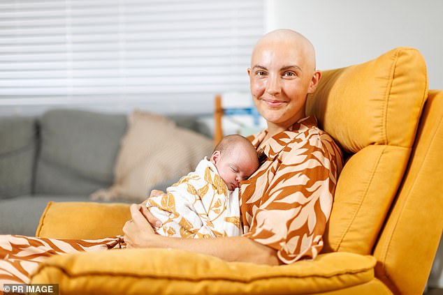 Emily Wiles and baby at Brisbane's Mater Hospital after a 5kg tumor was removed from her ovaries.