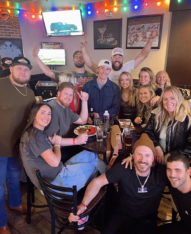 Travis Kelce is seen smiling with his Chiefs teammates after a shooting during the parade.  Despite the tragedy, he continued to party Wednesday night