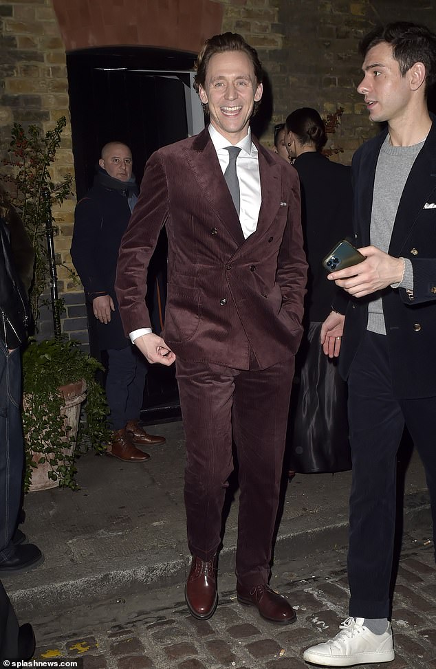 Michelle wasn't the only star looking for a night out on the town to celebrate, as Tom Hiddleston, 43, looked dapper as ever in a brown corduroy suit with a classic double-breasted blazer.