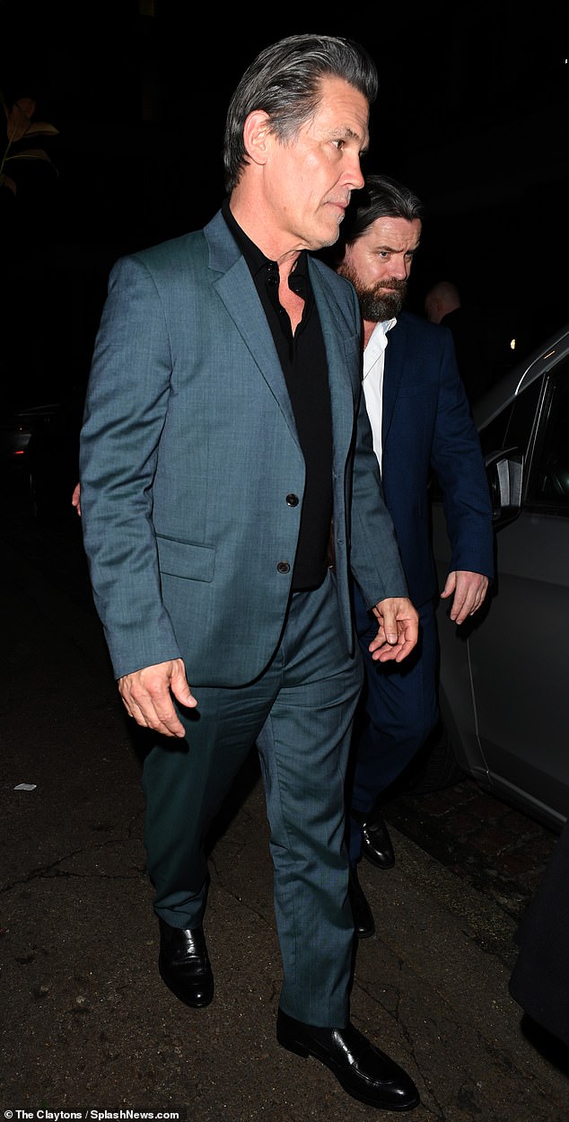 Josh Brolin also looked charming in a blue suit at the star-studded event.  The Goonies star, 56, wore a shiny blue suit paired with a black shirt and black suit shoes