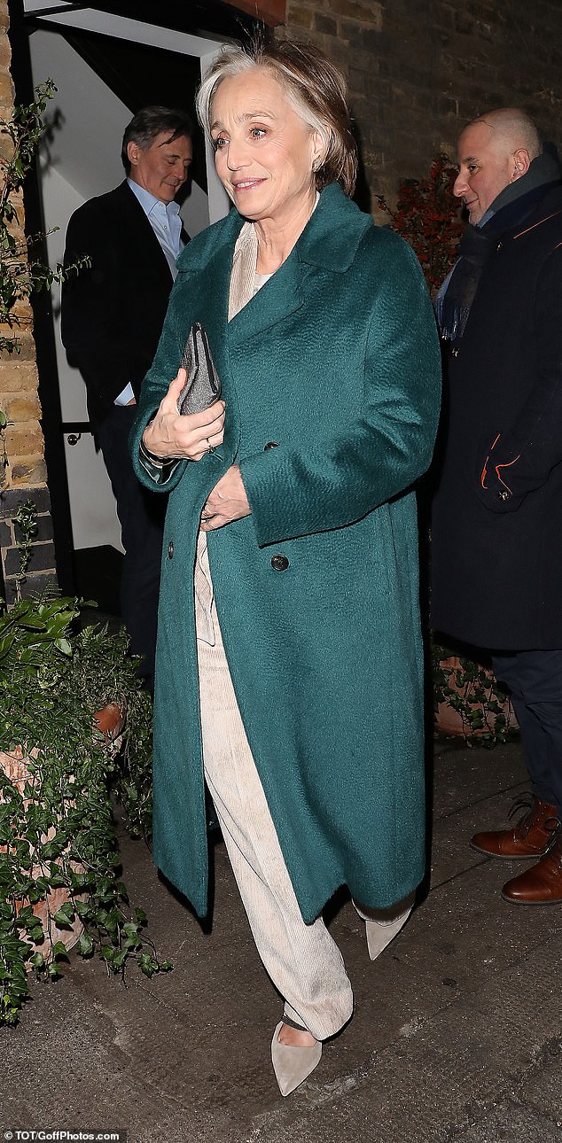 Kristin Scott Thomas, 63, added a pop of color to the outing and looked stunning as she stepped out in an emerald green trench coat