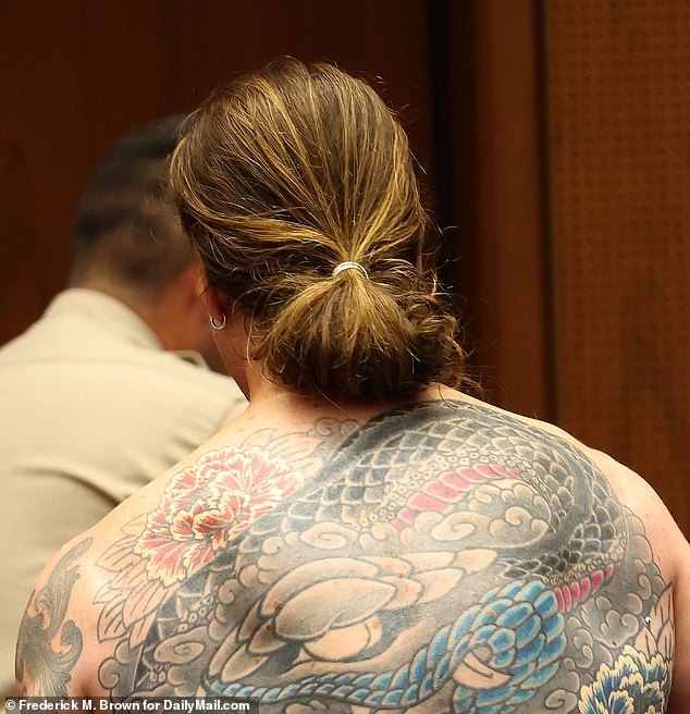 The heavily tattooed 35-year-old is on suicide watch at the LAPD's Valley Jail in Van Nuys