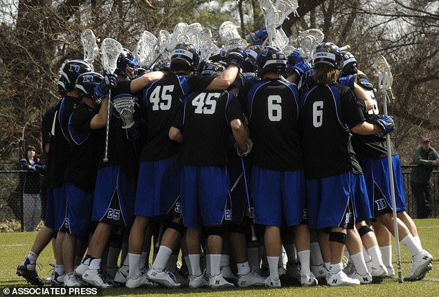 The coach was forced to resign and the university canceled the remainder of the season.  Pictured: Duke lacrosse players wearing practice jerseys representing the numbers of Dave Evans (6), Collin Finnerty (13) and Reade Seligmann (45)