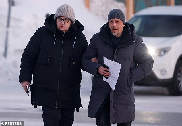 Lyudmila Navalnaya, the mother of the late Russian opposition leader Alexei Navalny, and lawyer Vasily Dubkov arrive at the regional branch of the Russian Investigative Committee in the city of Salekhard in the Yamal-Nenets region, Russia on February 17, 2024