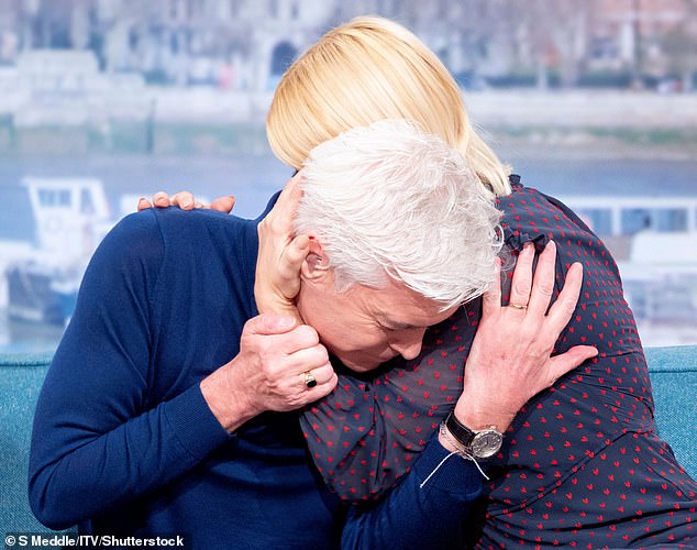 Phillip Schofield and Holly Willoughby embrace as he comes out as gay TV show 'This Morning' in 2020 before the pandemic