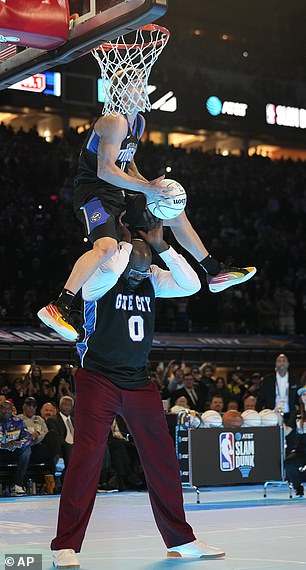 McClung dove over Shaquille O'Neal to win the event