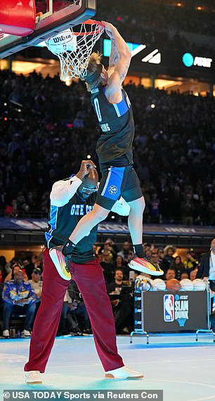 He cleared the ball off the back of O'Neal's neck before finishing with a reverse dunk