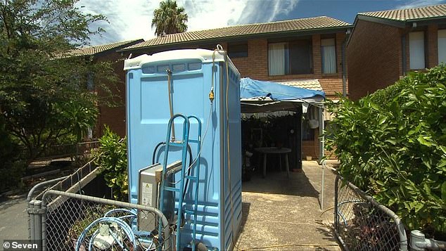 The portable shower makes Mr Kinross feel humiliated and he worries that the neighbors will see him showering.  He showers around 5:30 now, so he's not embarrassed