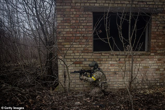 Citizens take part in a military training day organized by the Ukrainian Volunteer Army on February 17, as the two-year war approaches