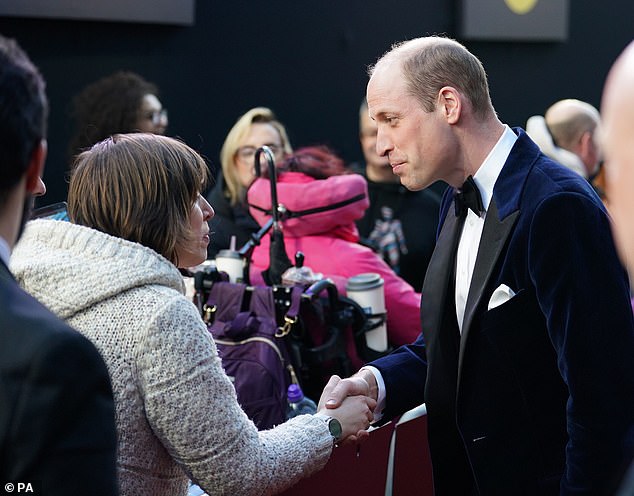 A handshake from a film fan;  the prince probably asked questions about both his wife and his father's health