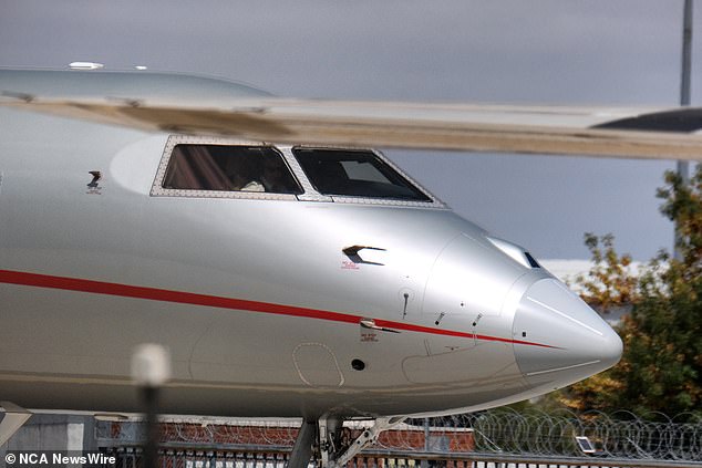 The pop star's plane (pictured) was delayed by about half an hour after wild storms hit Sydney