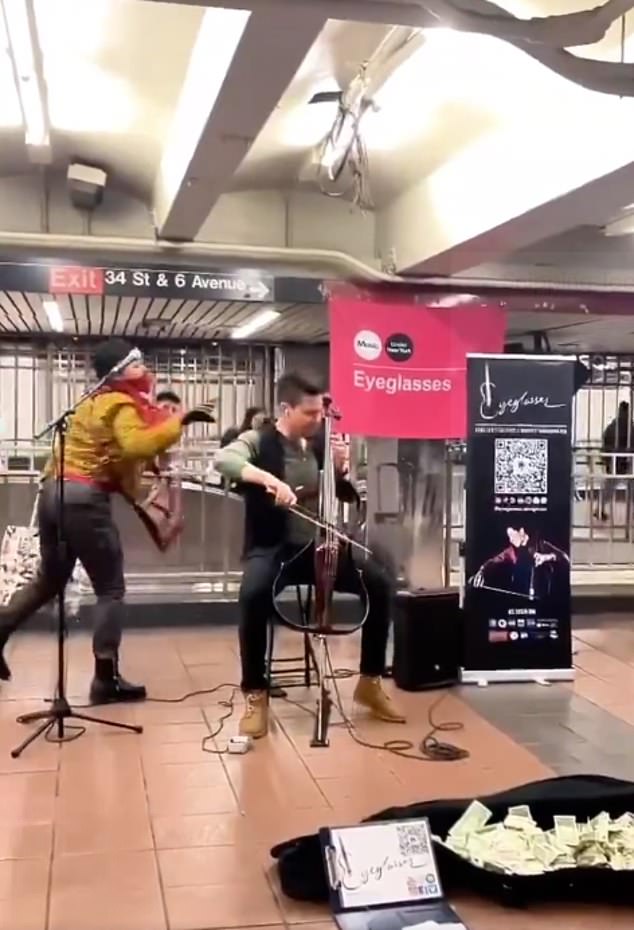 Iain Forrest, 29, a medical student and musician, played his electric cello at the 34th Street Herald Square Station on the evening of February 13.