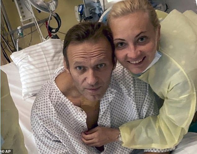 This handout photo, published by Russian opposition leader Alexei Navalny on his Instagram account, shows himself and his wife Yulia posing for a photo at a hospital in Berlin, Germany