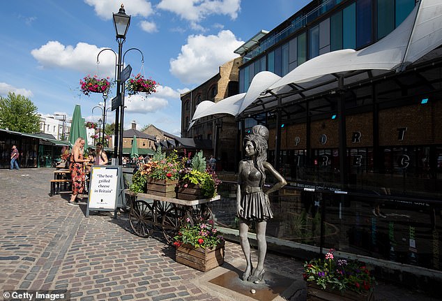 The statue commemorates the life of Amy, who tragically died in 2011, and is often laden with flowers