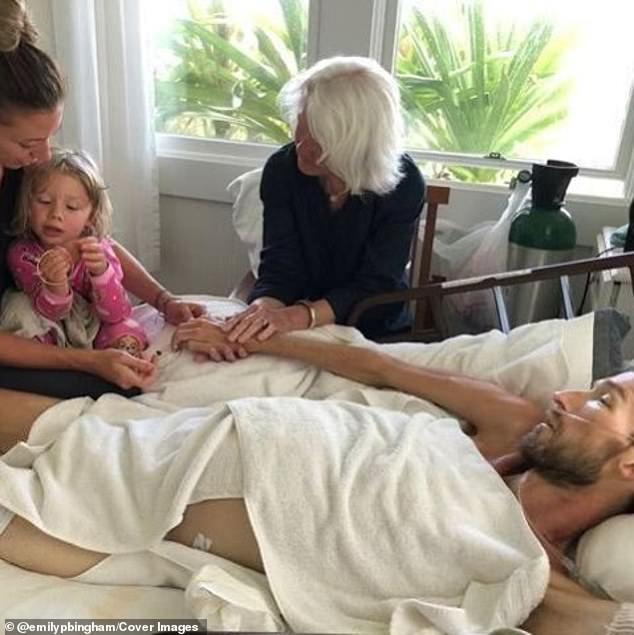 The couple celebrated the arrival of their daughter Izzy, followed by the birth of their son Theo.  Ian is seen here with his daughter at his bedside