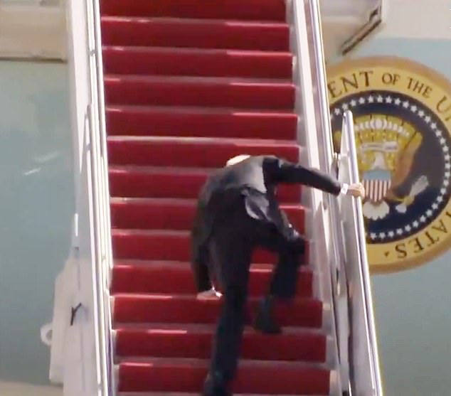 Biden has fallen on the steps of Air Force One several times, prompting frequent use of the shorter, lower abdominal stairs over the past year.  Pictured: Biden falls to his knees after slipping three times while climbing the stairs of Air Force One on March 18, 2021