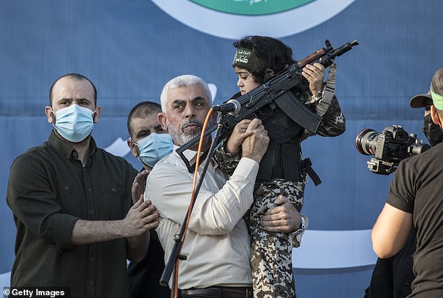 Yahya Sinwar, the elected leader of Hamas, appears at a ceremony for fighters killed by Israeli airstrikes at the Yarmouk football stadium in Gaza City on May 24, 2021.