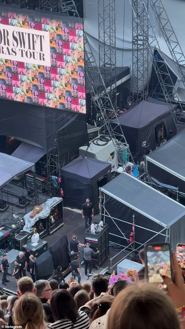 A fan posted a video to Instagram on Friday from Swift's Melbourne show, showing the pop star being pushed to the side of the stage in a cleaning cart