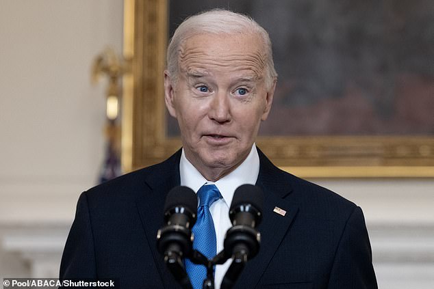 US President Joe Biden delivers a speech in the State Dining Room of the White House