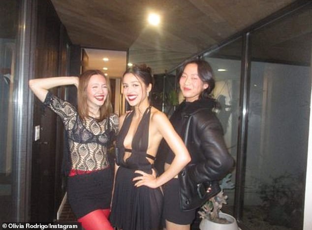 The three-time Grammy winner made sure to invite her closest friends - Unstable actress Iris Apatow (L) and The Brothers Sun actress Madison Hu (R) - who both appeared in her music videos for Bad Idea Right and SOUR Prom