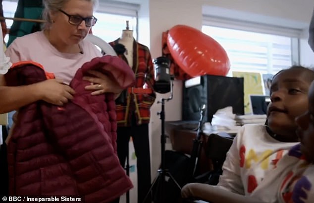 Marieme and Ndeye seemed excited as the designer debuted their new jackets.  The girls were given two custom-made jackets: a padded jacket (pictured) to keep you warm and another to keep you dry in the rain.