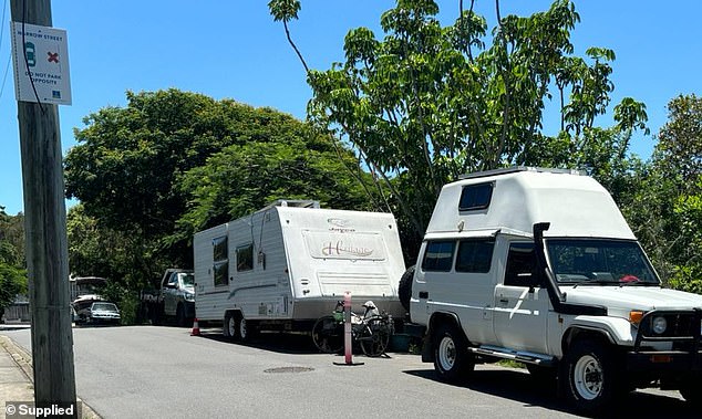 One photo illustrates the caravan and 4WD parked opposite a sign that reads: 'Narrow street - do not park opposite'