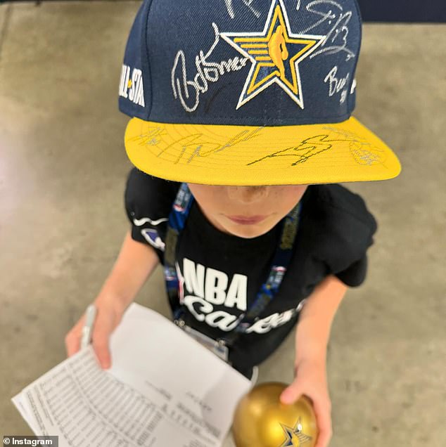 Theodore had the players sign his blue and yellow NBA All-Stars hat