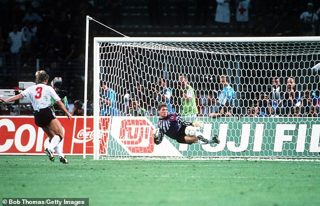 German goalkeeper Bodo Illgner saves from England's Stuart Pearce in the 1990 semi-final