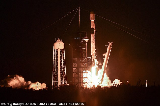 A SpaceX rocket carrying 23 Starlink satellites lifts off from Kennedy Space Center on January 28