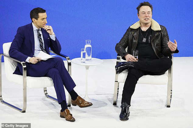 NYT columnist Andrew Ross Sorkin and Elon Musk speak at the New York Times annual DealBook summit on November 29, 2023 in New York City