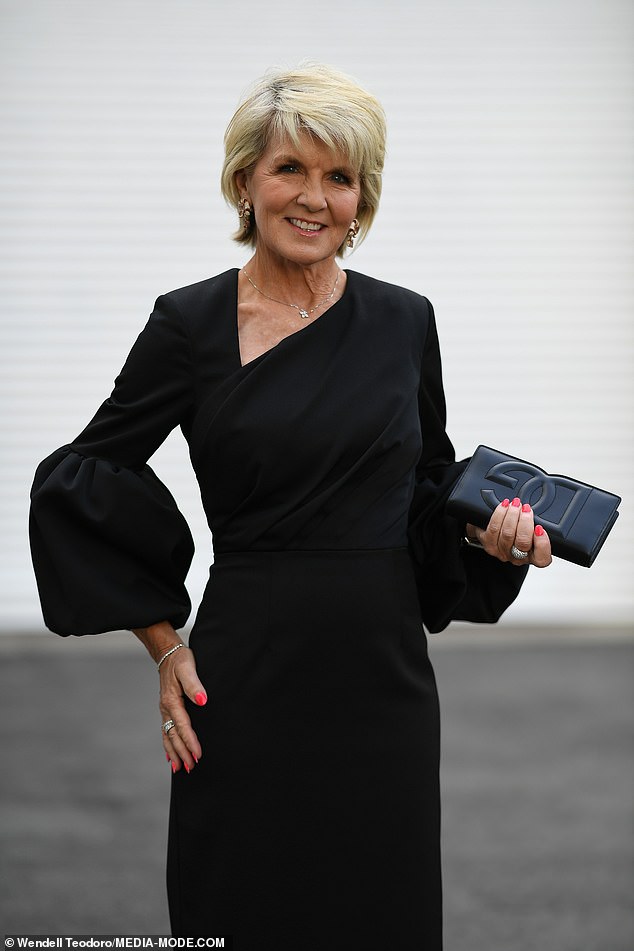 The former politician, 67, looked glamorous and chic in head-to-toe black