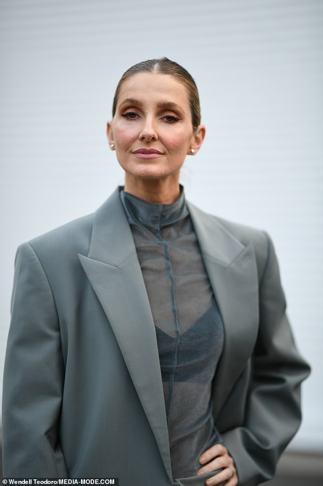 The former Foxtel presenter was the epitome of sophistication in a grey-green blazer and matching skirt paired with a sheer blouse underneath