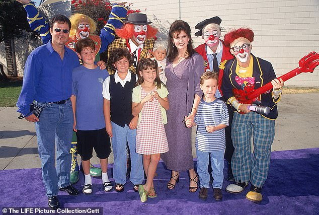 (L) Donny Osmond with his son (2L) and Marie (5L) with her children and circus performers at Barnum & Bailey benefit the Make-A-Wish Foundation in the 1980s