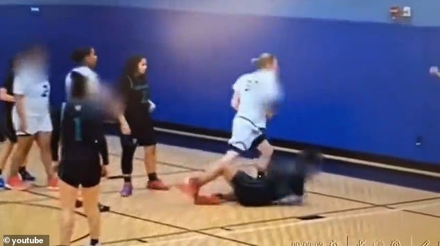 Video shows the transgender player ripping the ball out of another player's arms, forcing her to fall.
