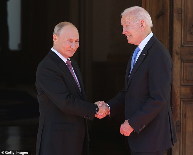 Russian President Vladimir Putin (left) greets US President Joe Biden (right) during the 2021 US-Russia Summit at the La Grange Villa near Lake Geneva, on June 16, 2021