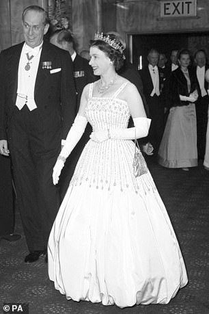 Queen Elizabeth II arrives at the Odeon, Leicester Square, London for the charity world premiere of the film 'Lawrence of Arabia' in 1962