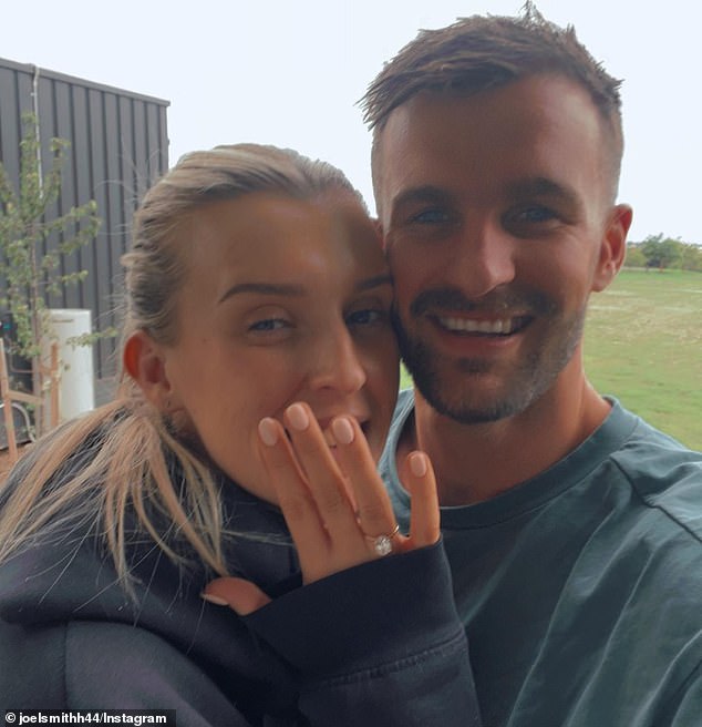 Smith (pictured with fiancée Elise Carroll) has been accused of sending text messages about cocaine to other players in Melbourne