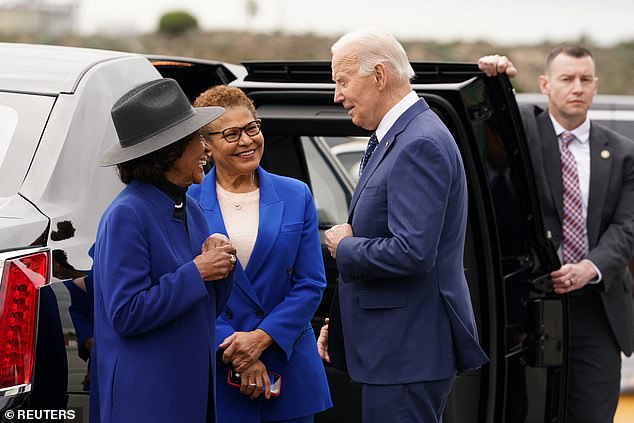 U.S. Representative Maxine Waters (D-CA) and Los Angeles Mayor Karen Bass greet U.S. President Joe Biden upon his arrival in Los Angeles, California on Tuesday afternoon