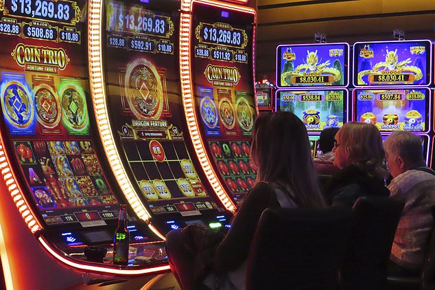 Gamblers play slot machines at the Ocean Casino Resort in Atlantic City.  The city earned $5.77 billion in gambling revenue in 2023