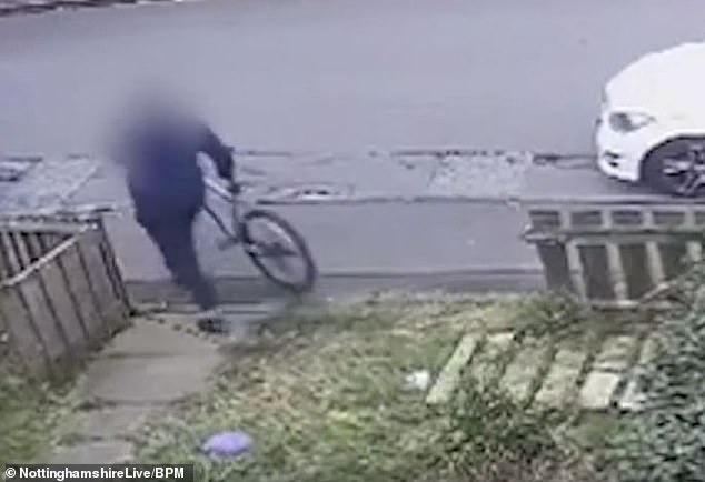 The thief calmly drives the bicycle back to his van