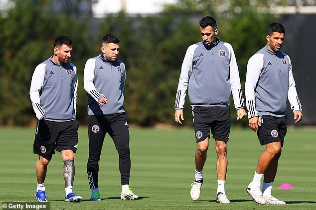 Luis Suarez (right) teams up with Messi, Jordi Alba and Sergio Busquets (LR) in Miami