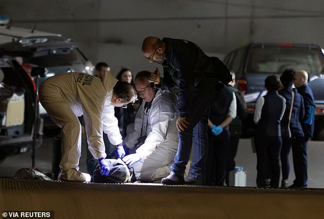 Agents of the Spanish Guardia Civil investigate the garage where the body of Russian pilot Kuzminov is located