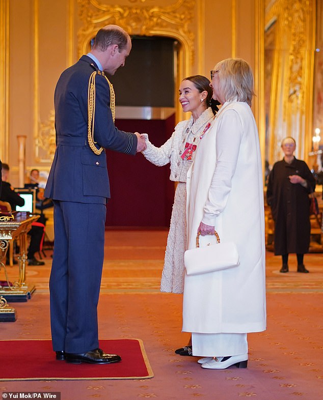 Emily and her mother co-founded SameYou, a brain injury recovery charity they set up after the actress survived two brain haemorrhages (pictured with Prince William)