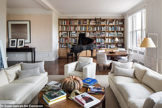 The photographer also added a library wall to the 600-square-foot living room, complete with an extension ladder