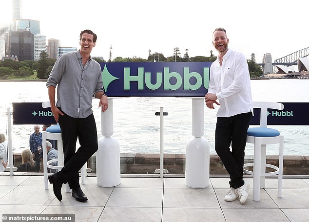 Hamish wore a white button-up shirt, black trousers and white sneakers, while Andy wore a gray shirt and black trousers as they posed at the event