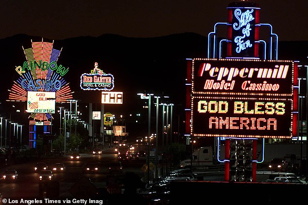 Just off Highway 80, near the Utah border, the Peppermill Hotel Casino proudly lit up their neon sign with a patriotic message in a file photo