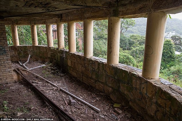 The Daily Telegraph reports that a development application has been approved for the site, sending potential buyers into a frenzy.  In the photo: the amazing view: the house was abandoned twenty years ago