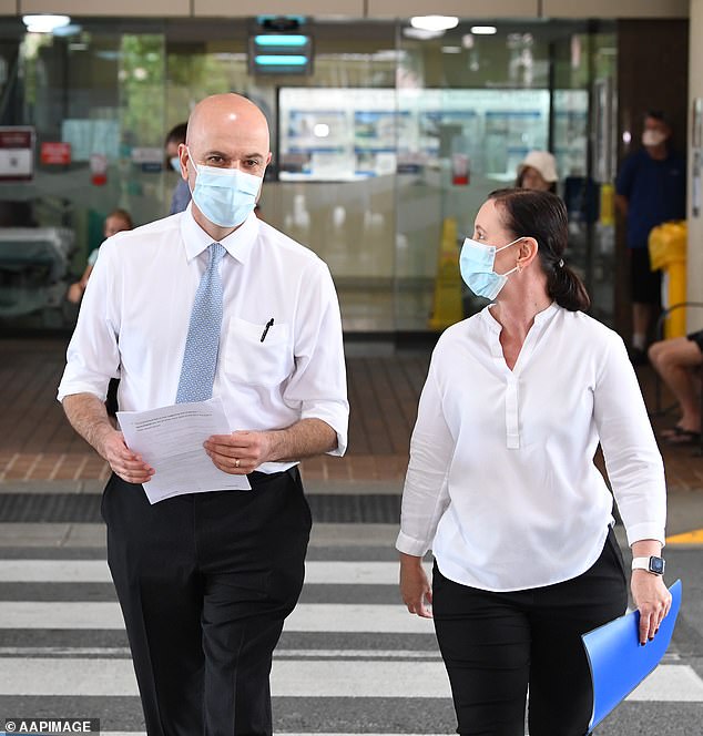 Yvette D'Ath (right) with Queensland Chief Health Officer Dr.  John Gerrard (left) at a news conference in January 2022 when she was the state's health minister