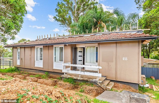 That is below the average house price in all Australian capitals.  But there are opportunities if they buy a run-down house near Mount Druitt in Sydney's far west (pictured is a house on a market in Bidwill with an auction price of $600,000)